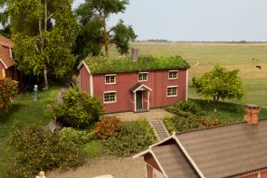Norskt Hus med grästak.
