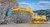 LIEBHERR 974 with demolition chisel and protective cage.