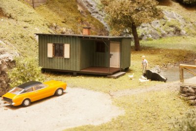Trädgårdsskjul m. veranda.