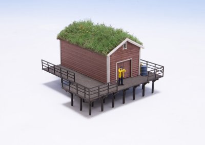 Brygga till båthus